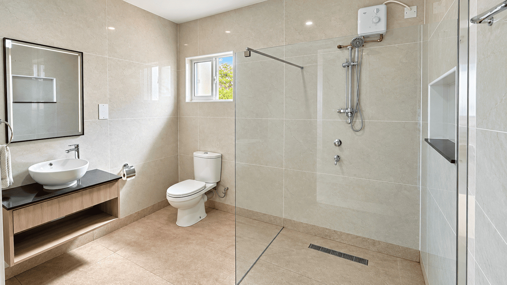 Bathroom with a walk-in shower in a Creole Cottage apartment
