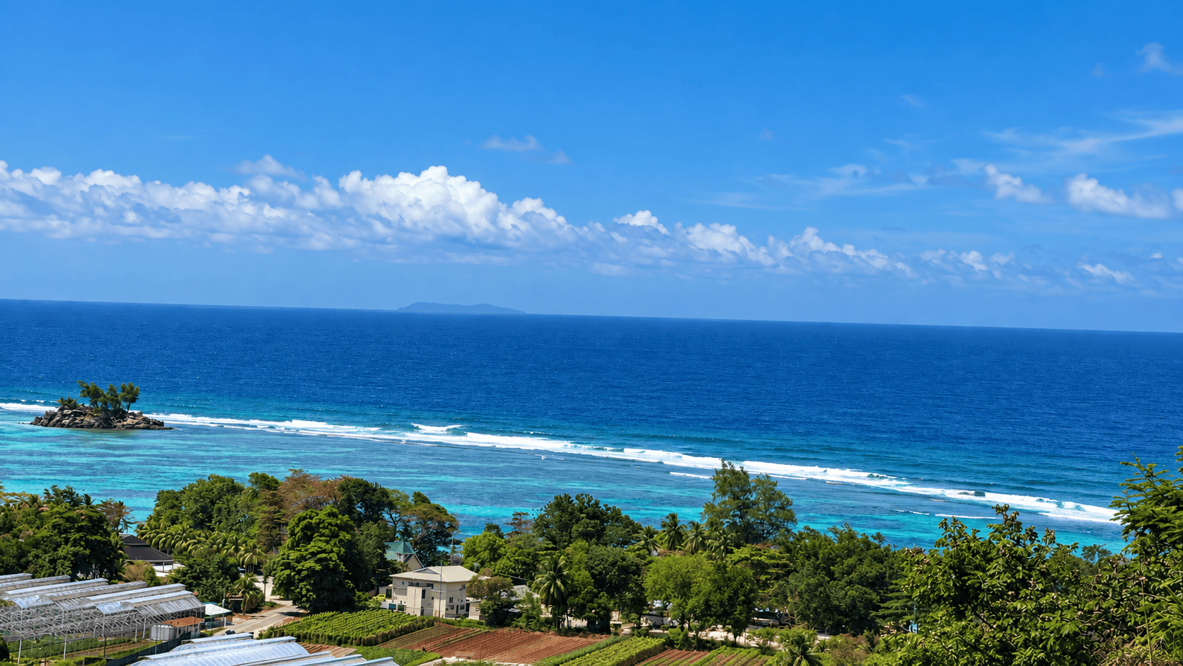 Turquoise water and the coastline at Anse Royale near Creole Cottage Apartment